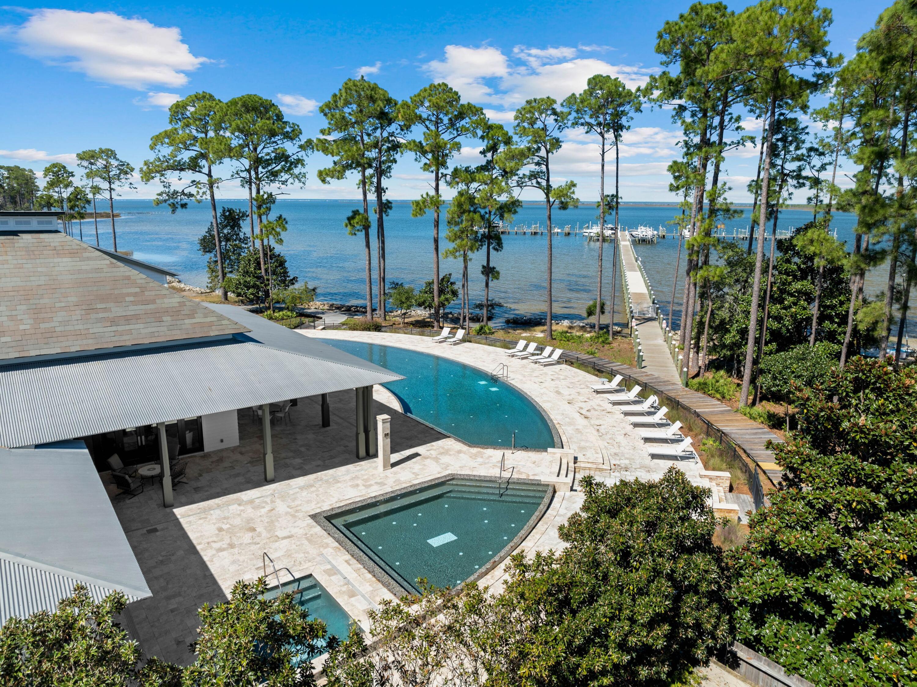 Lot 44 Perrin Santa Rosa Beach Santa Rosa Beach, FL 32459 - Photo 13 of 15 a view of a house with a swimming pool