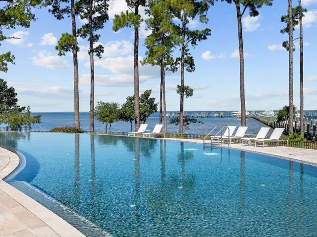 a view of a room with gym equipment and a large window