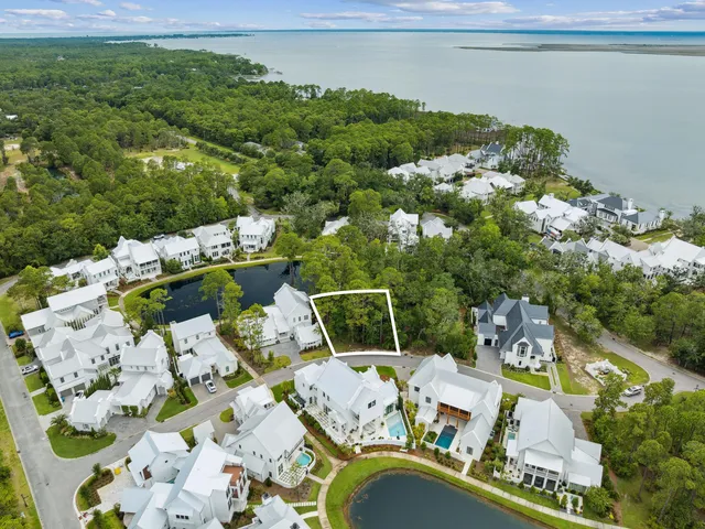 a view of a balcony with an outdoor seating