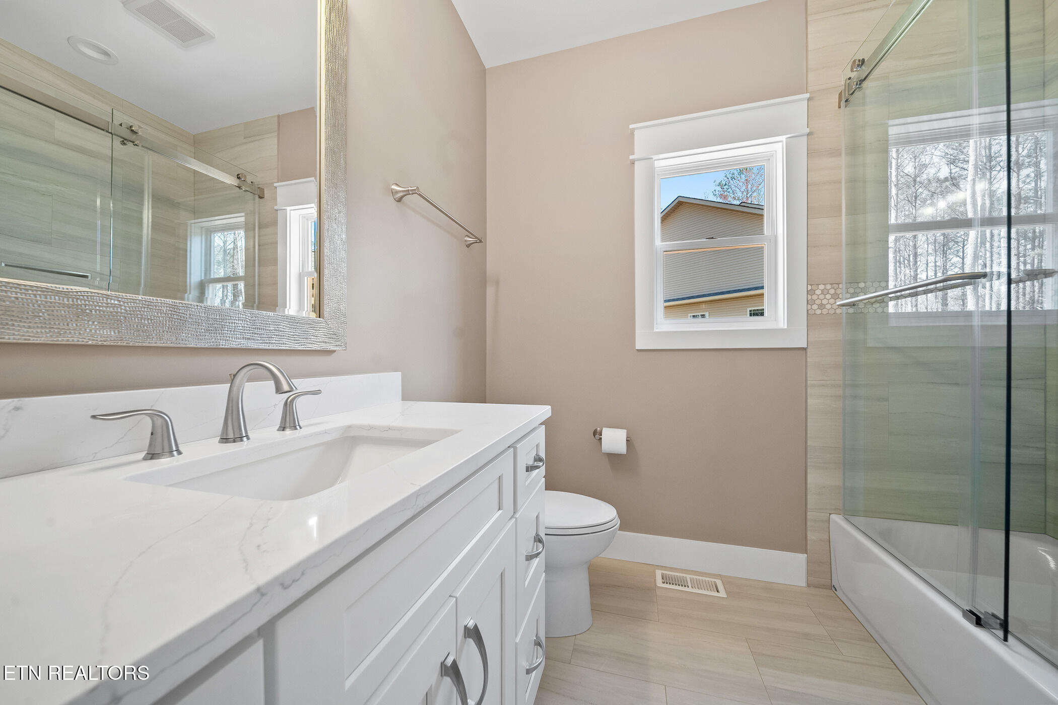 214 Cheeyo Trace Loudon, TN 37774 - Photo 24 of 42 guest bathroom quartz counters shaker ca