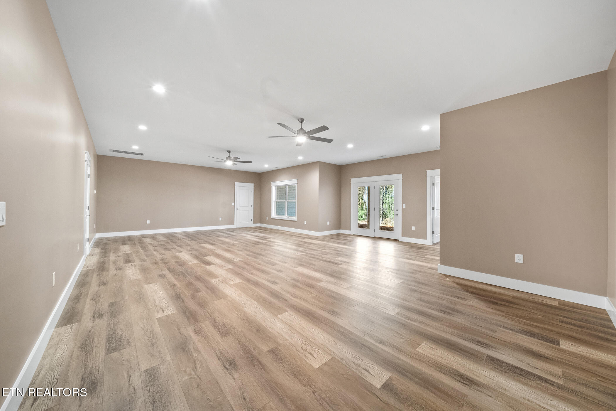 214 Cheeyo Trace Loudon, TN 37774 - Photo 29 of 42 bright basement rec room