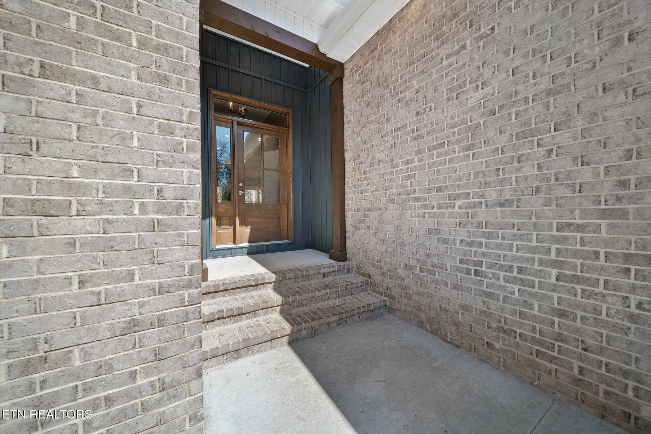 214 Cheeyo Trace Loudon, TN 37774 - Photo 38 of 42 brick exterior covered entry