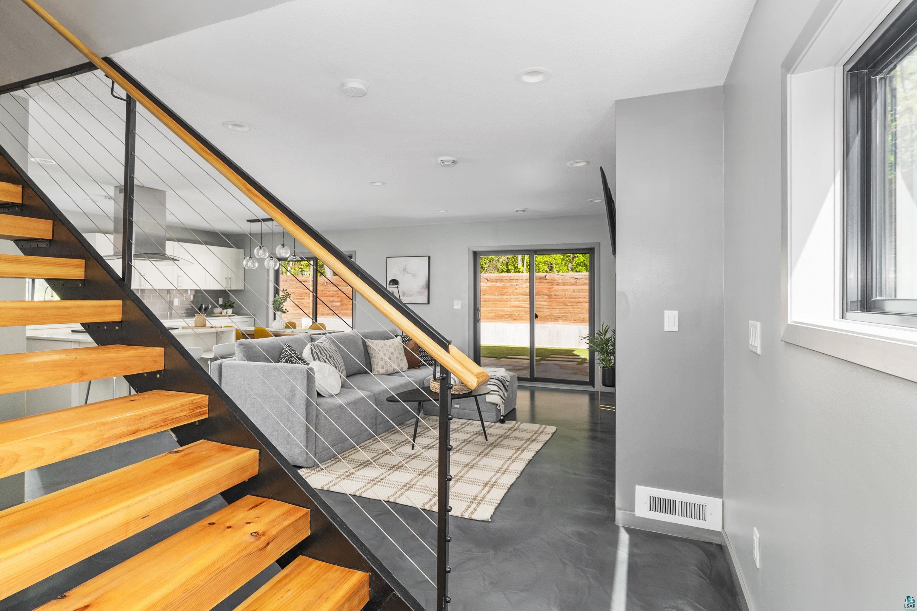 3625 London Road Duluth, MN 55804 - Photo 12 of 28 Stairway with concrete floors