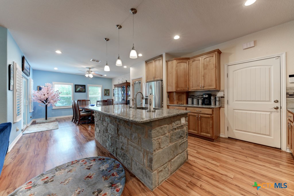 861 Rutherford Fischer, TX 78623 - Photo 13 of 38 Spacious dining area off kitchen can accommodate large table.