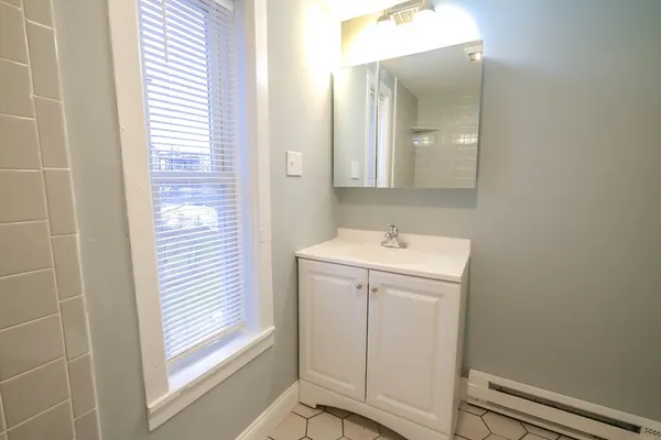 a utility room with a window dryer and washer