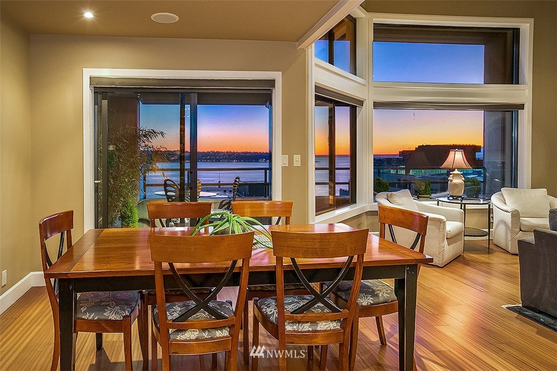 2021 1st Avenue, Unit E6 Seattle, WA 98121 - Photo 6 of 32 a view of a dining room with furniture window and outside view