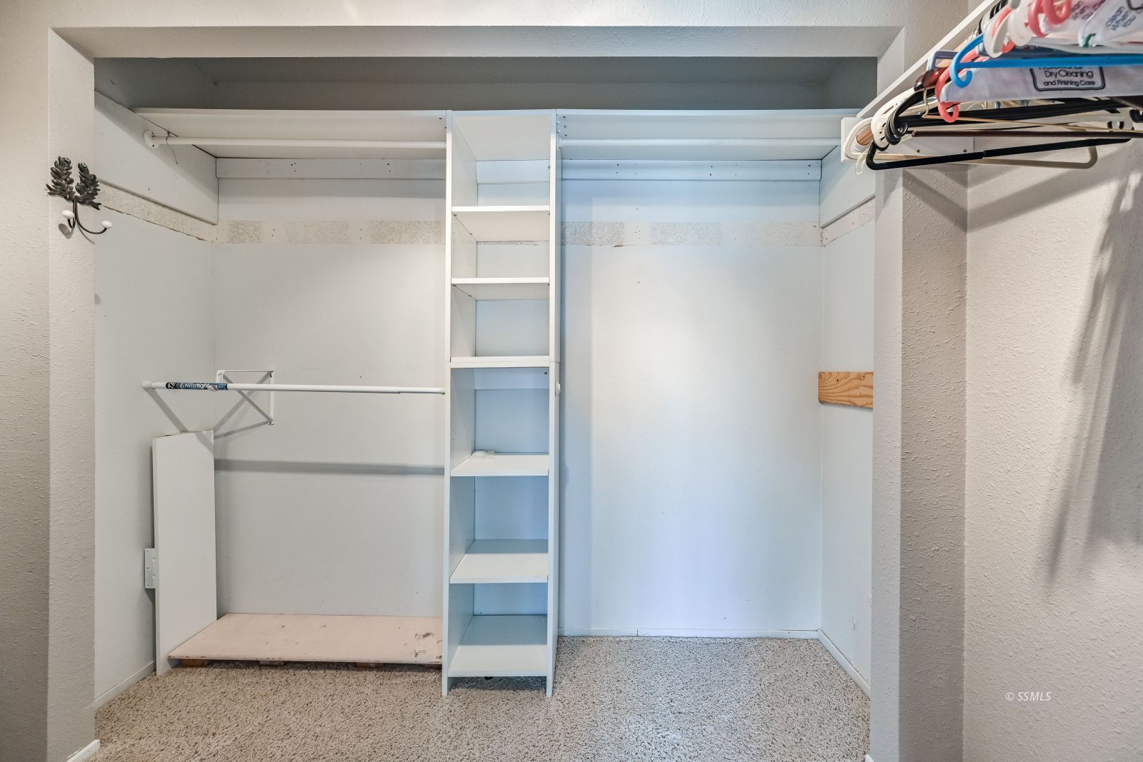 131 Chambers Street Ridgecrest, CA 93555 - Photo 15 of 28 a view of walk in closet with empty racks