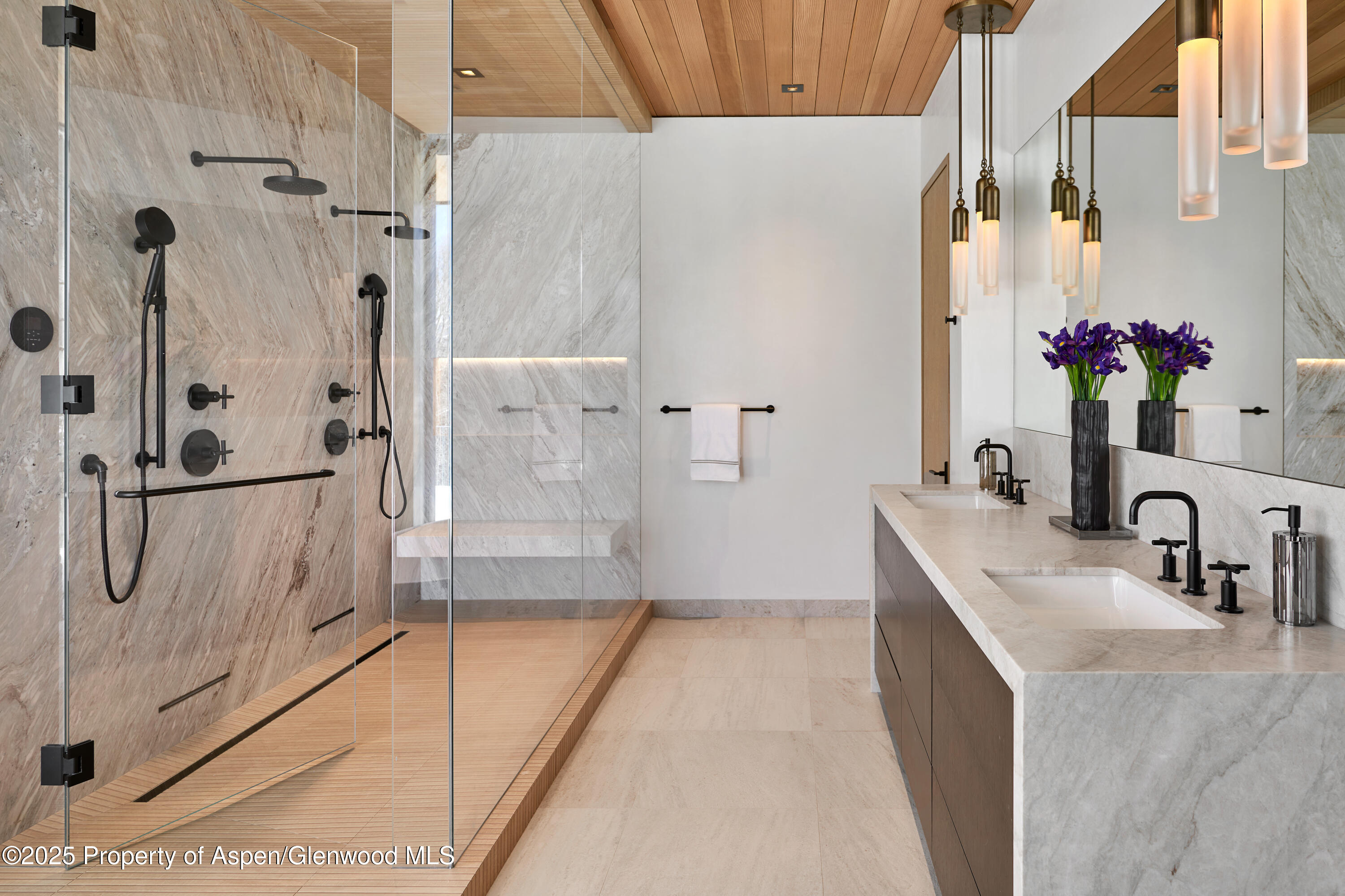 395 East Reds Road Aspen, CO 81612 - Photo 23 of 51 a bathroom with a granite countertop shower a sink and a mirror