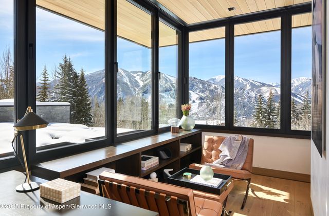 a kitchen with a sink and a refrigerator