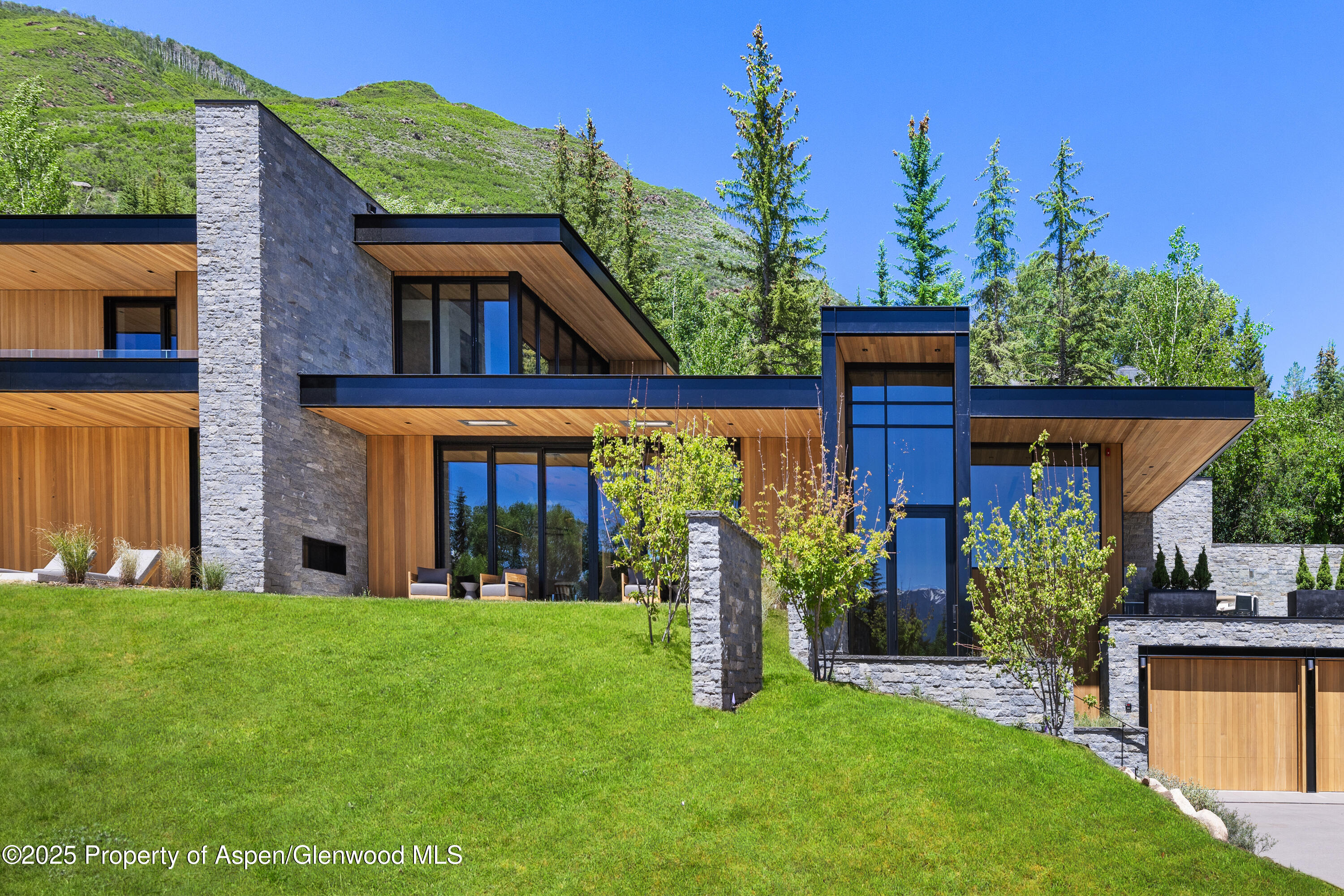 395 East Reds Road Aspen, CO 81612 - Photo 3 of 51 front view of a house with a yard