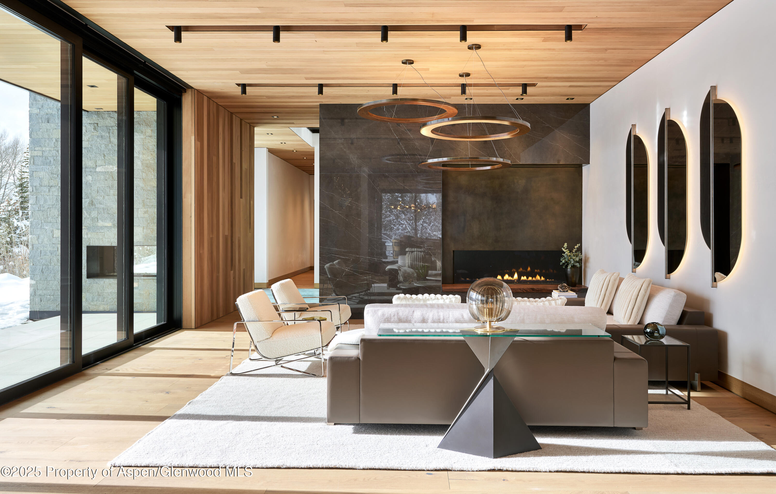 395 East Reds Road Aspen, CO 81612 - Photo 8 of 51 a view of a dining room with furniture and floor to ceiling window