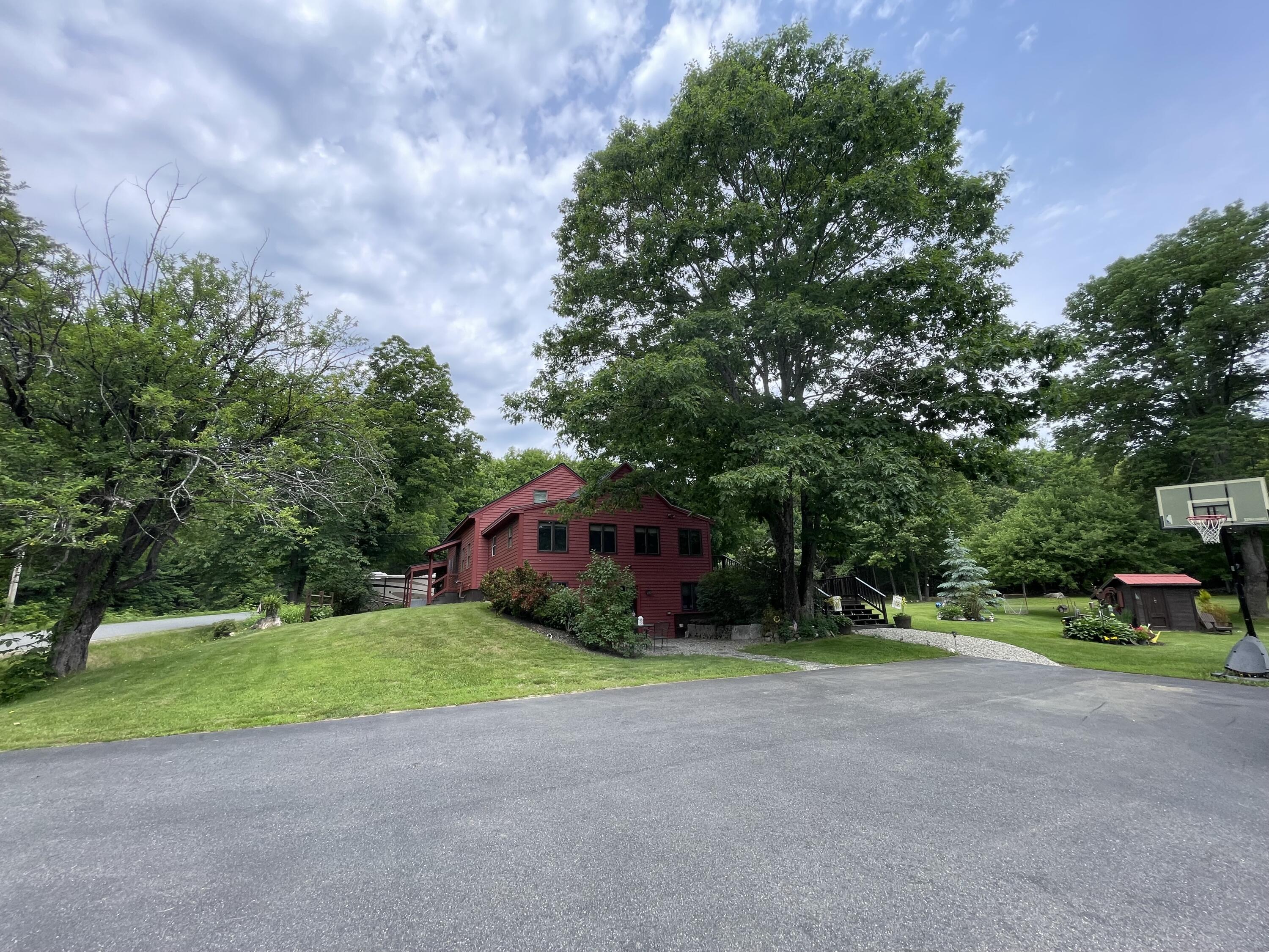277 Wooster Hill Road Rome, ME 04963 - Photo 3 of 49 Paved yard connecting both buildings