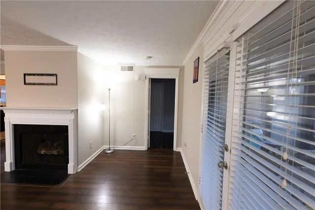 a view of a livingroom with wooden floor