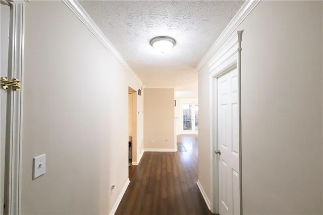 a view of a livingroom with furniture and wooden floor