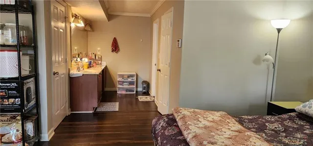 a front view of a house with parking space