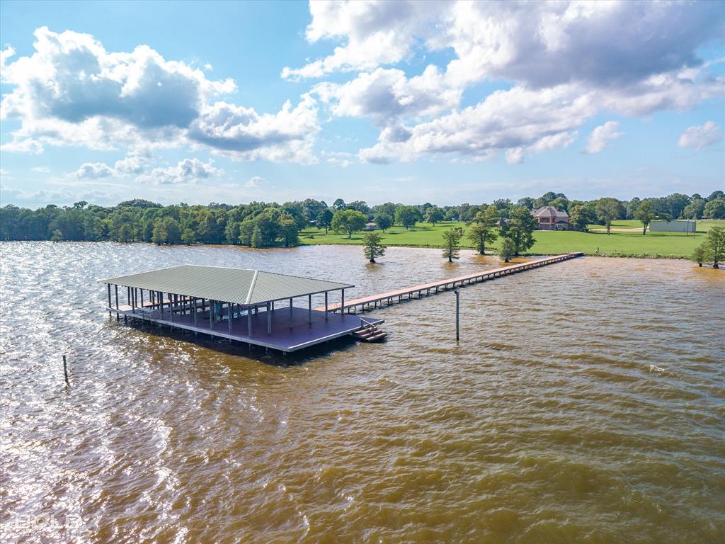 10099 Ferry Lake Road Oil City, LA 71061 - Photo 13 of 14 Private boathouse and pier with direct access to Caddo Lake