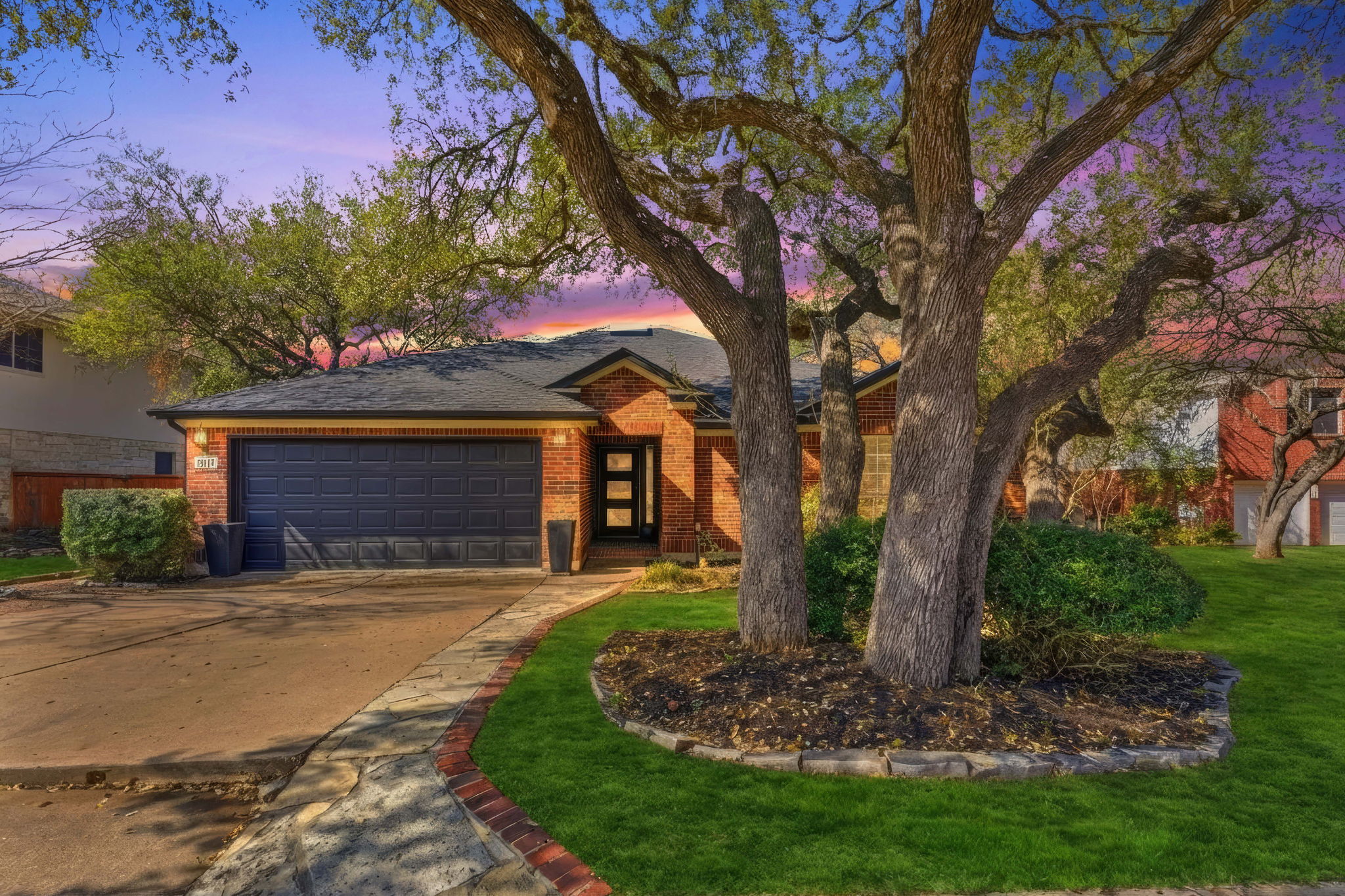 1511 Knoll Ridge Drive Cedar Park, TX 78613 - Photo 1 of 26 View of front of house with driveway, brick siding, an attached garage, and a front yard