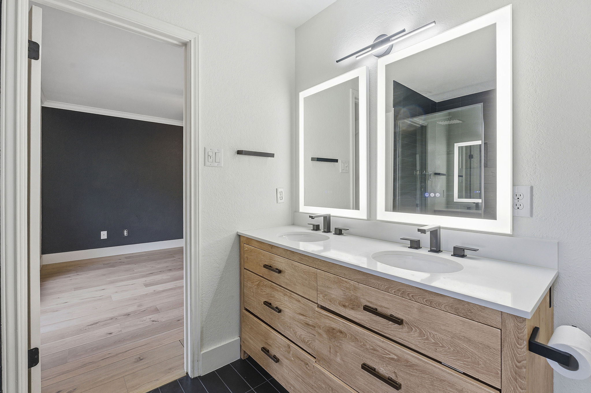1511 Knoll Ridge Drive Cedar Park, TX 78613 - Photo 14 of 26 Full bathroom with double vanity and baseboards