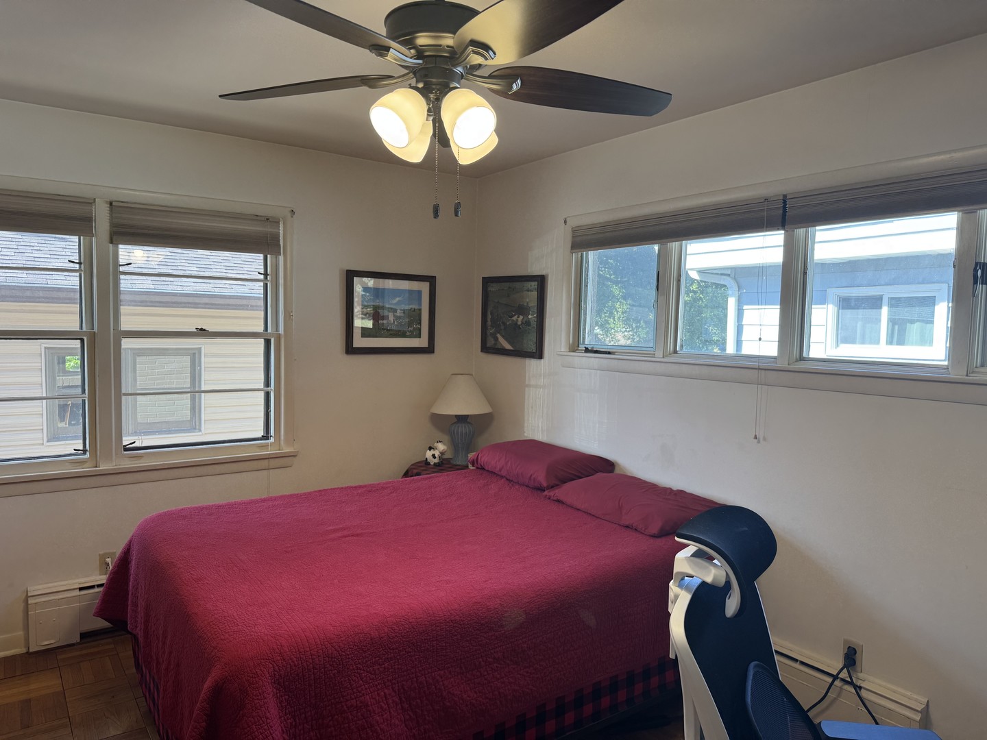 700 Garfield Road Harvard, IL 60033 - Photo 11 of 37 a bedroom with a bed and a chandelier