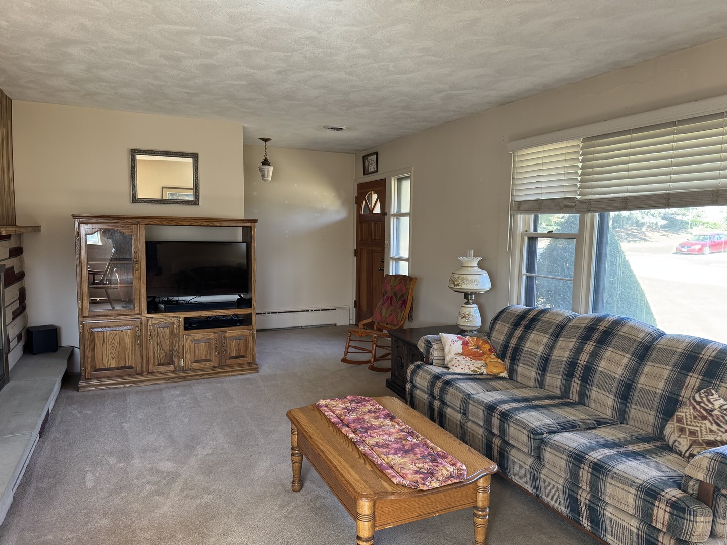 700 Garfield Road Harvard, IL 60033 - Photo 15 of 37 a living room with furniture and a flat screen tv