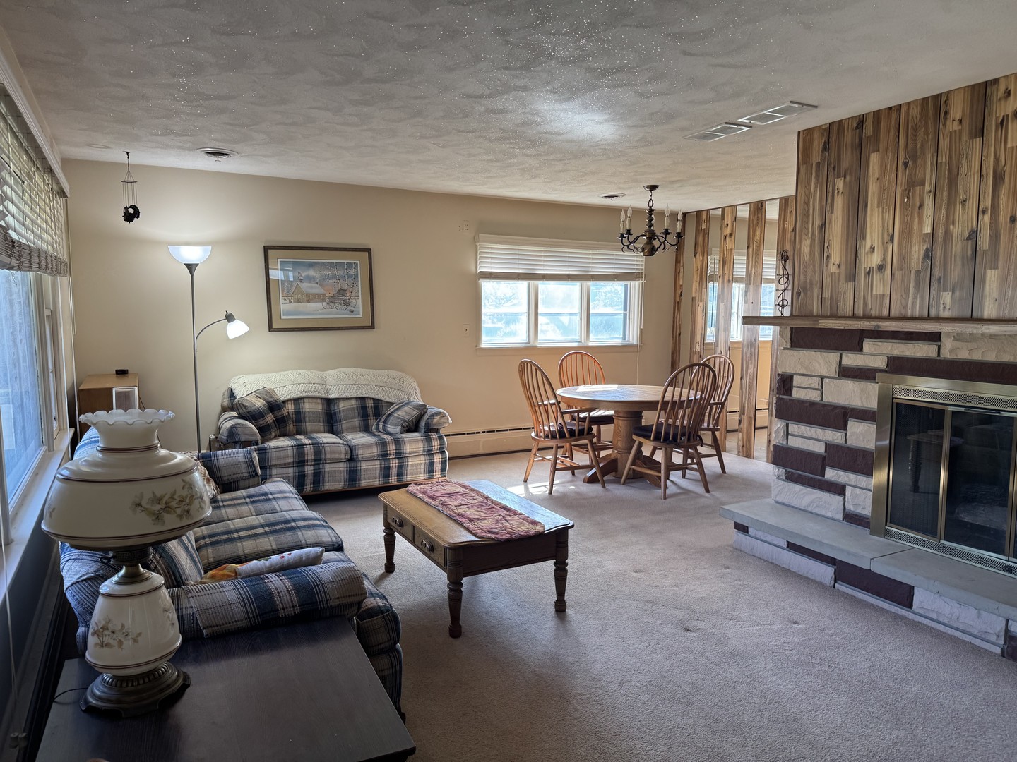 700 Garfield Road Harvard, IL 60033 - Photo 17 of 37 a living room with furniture and a fireplace