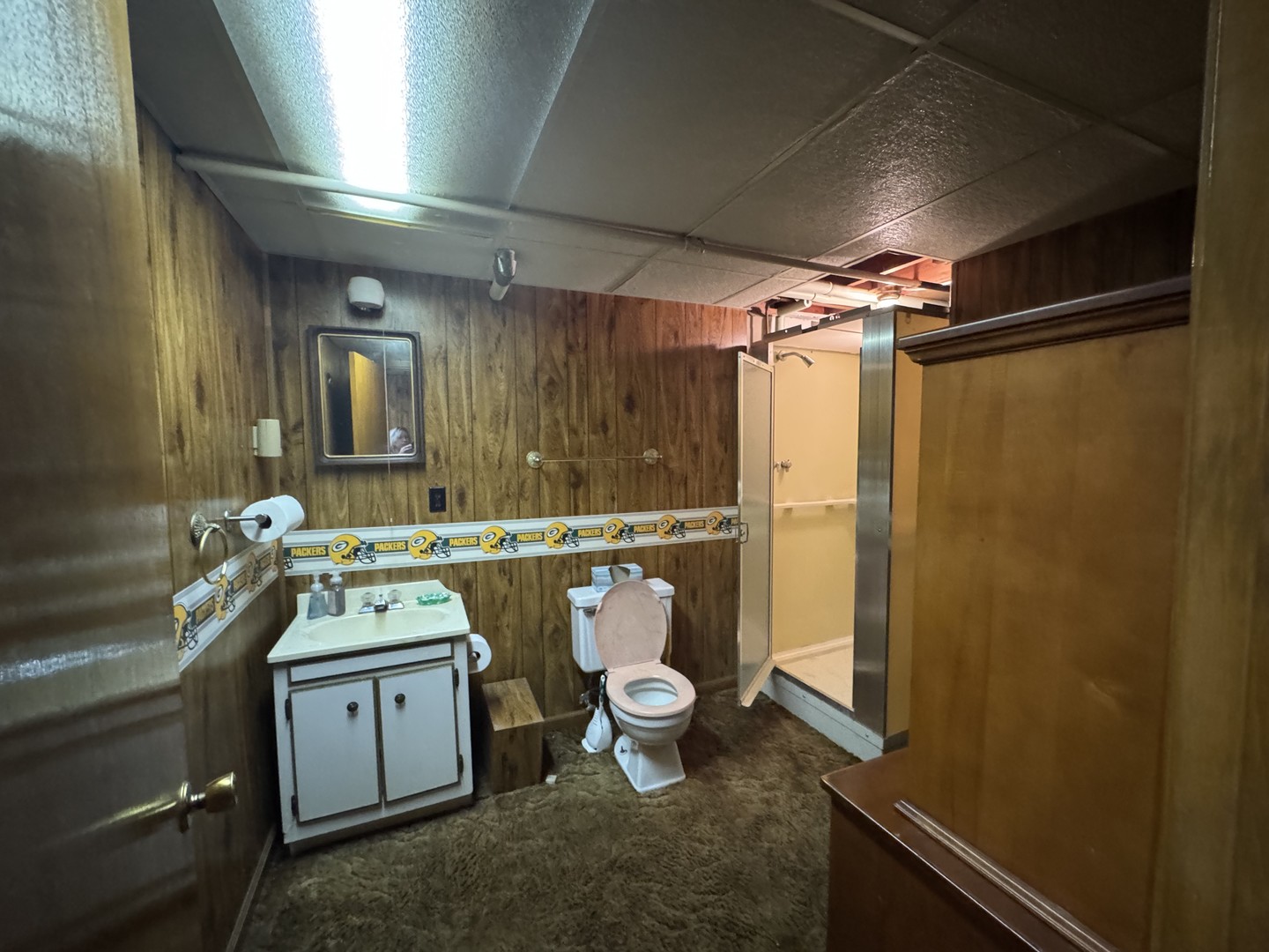 700 Garfield Road Harvard, IL 60033 - Photo 32 of 37 a bathroom with a sink a toilet and shower
