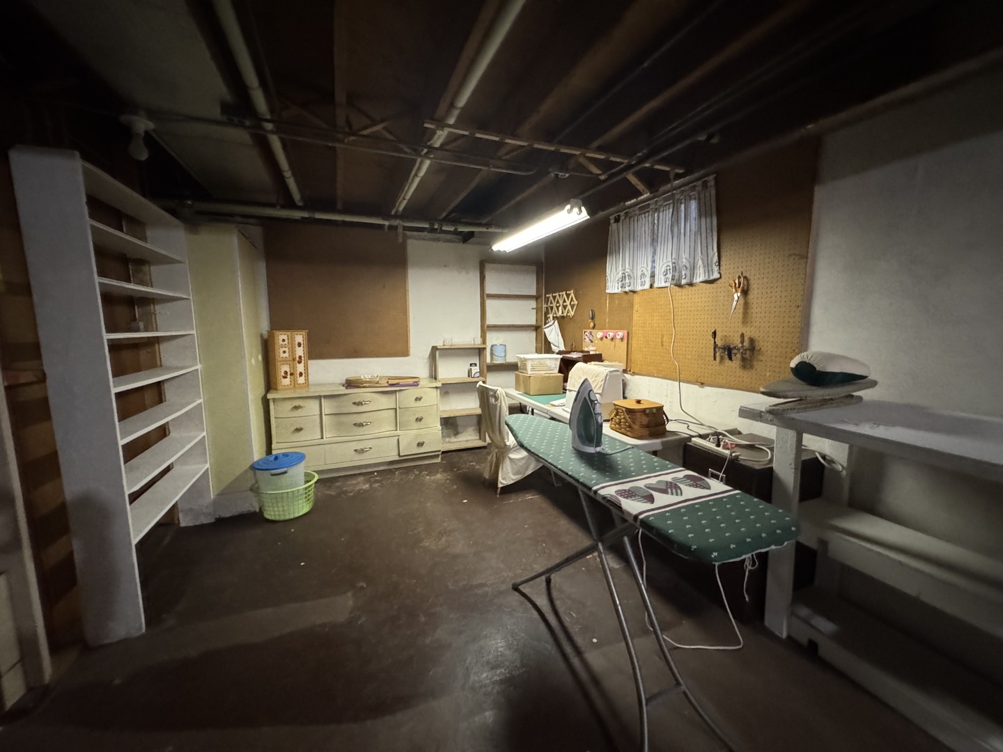 700 Garfield Road Harvard, IL 60033 - Photo 37 of 37 a storage room with lots of wooden furniture