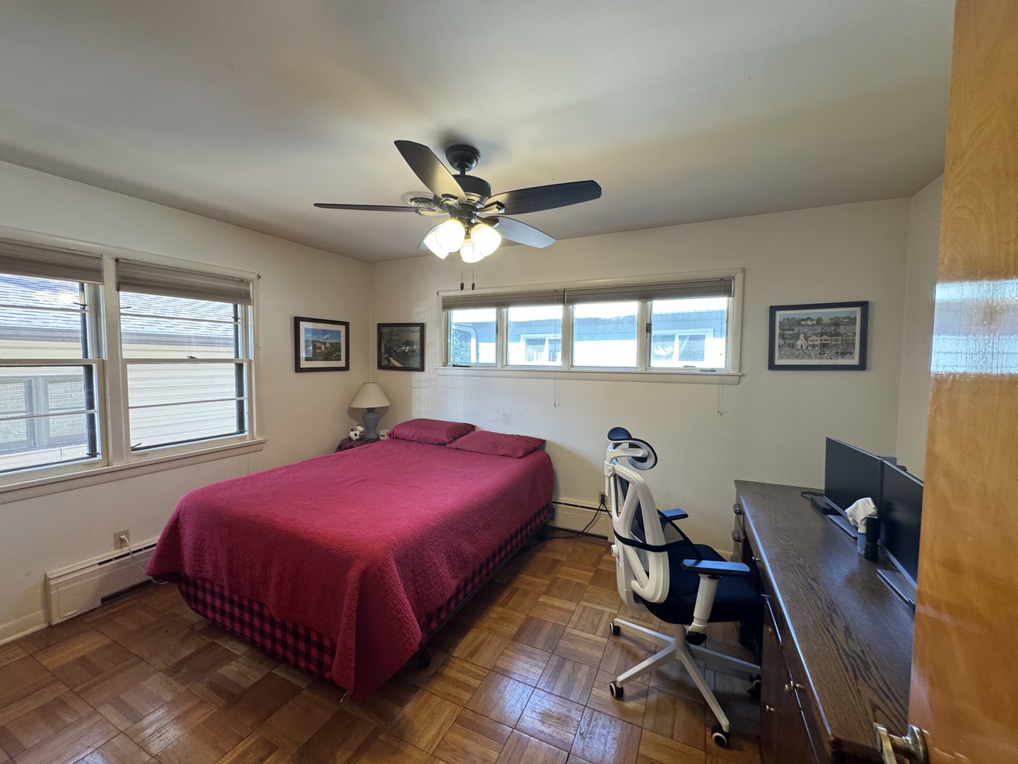 700 Garfield Road Harvard, IL 60033 - Photo 10 of 37 a bedroom with a bed and a chandelier