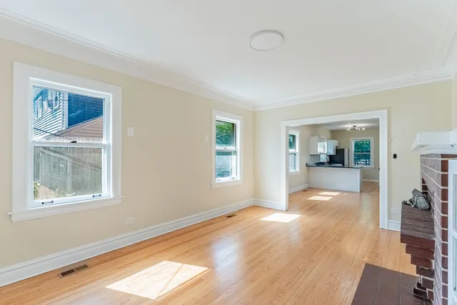 a view of livingroom with window and hardwood floor