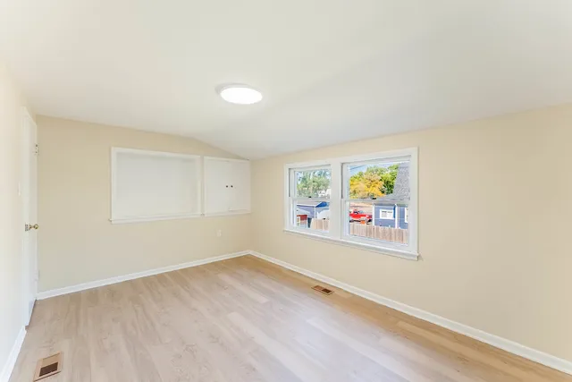 an empty room with window