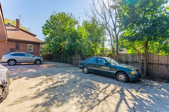 a car parked in front of a house