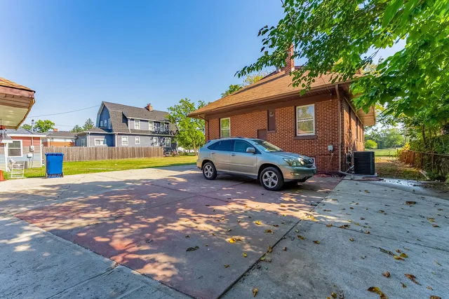 a car parked in front of a house