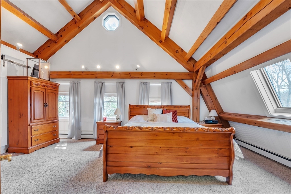 89 Kittery Avenue Rowley, MA 01969 - Photo 15 of 37 a bedroom with a bed and a window