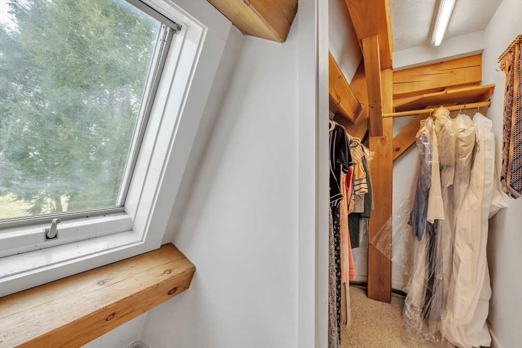 89 Kittery Avenue Rowley, MA 01969 - Photo 18 of 37 a view of walk in closet with clothes and shoes