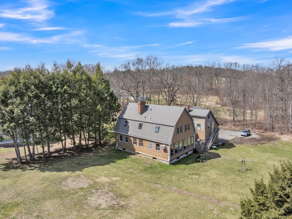 89 Kittery Avenue Rowley, MA 01969 - Photo 2 of 37 a view of a house with a yard