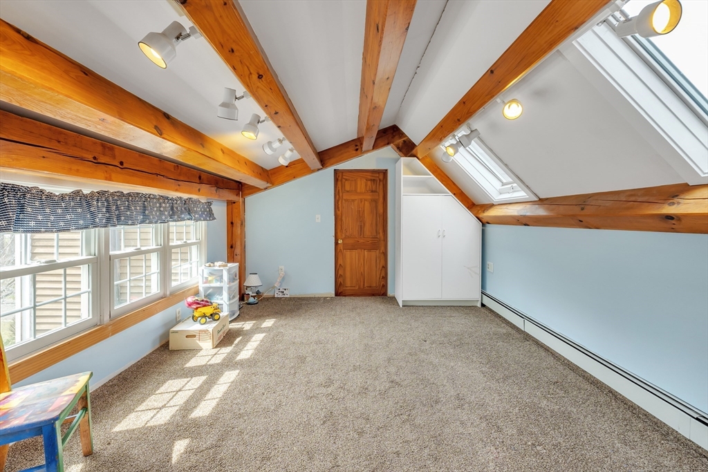 89 Kittery Avenue Rowley, MA 01969 - Photo 22 of 37 a view of an empty room with a window