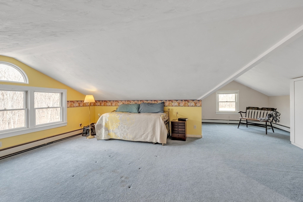 89 Kittery Avenue Rowley, MA 01969 - Photo 24 of 37 a living room with furniture and a large window