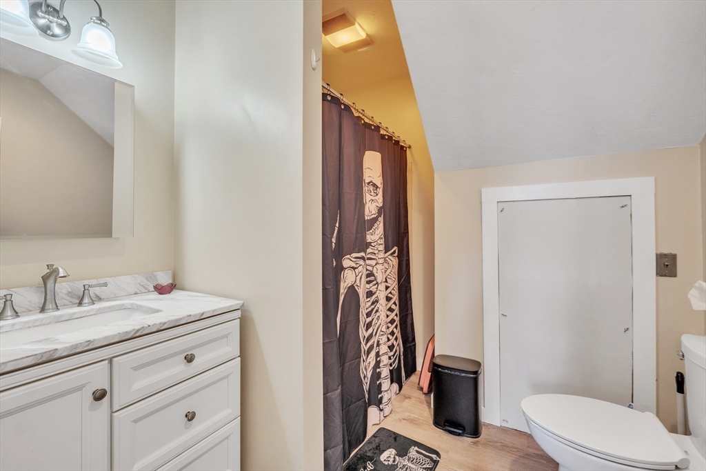 89 Kittery Avenue Rowley, MA 01969 - Photo 26 of 37 a bathroom with a granite countertop sink toilet and shower