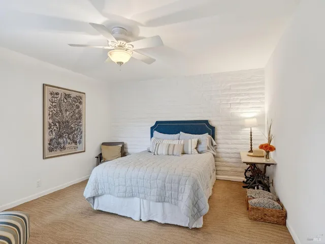a view of a hallway with washer and dryer