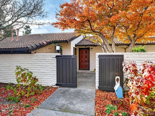a view of a tables and chairs on the deck