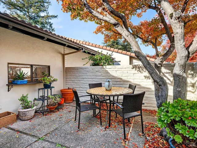 a front view of a house with outdoor space