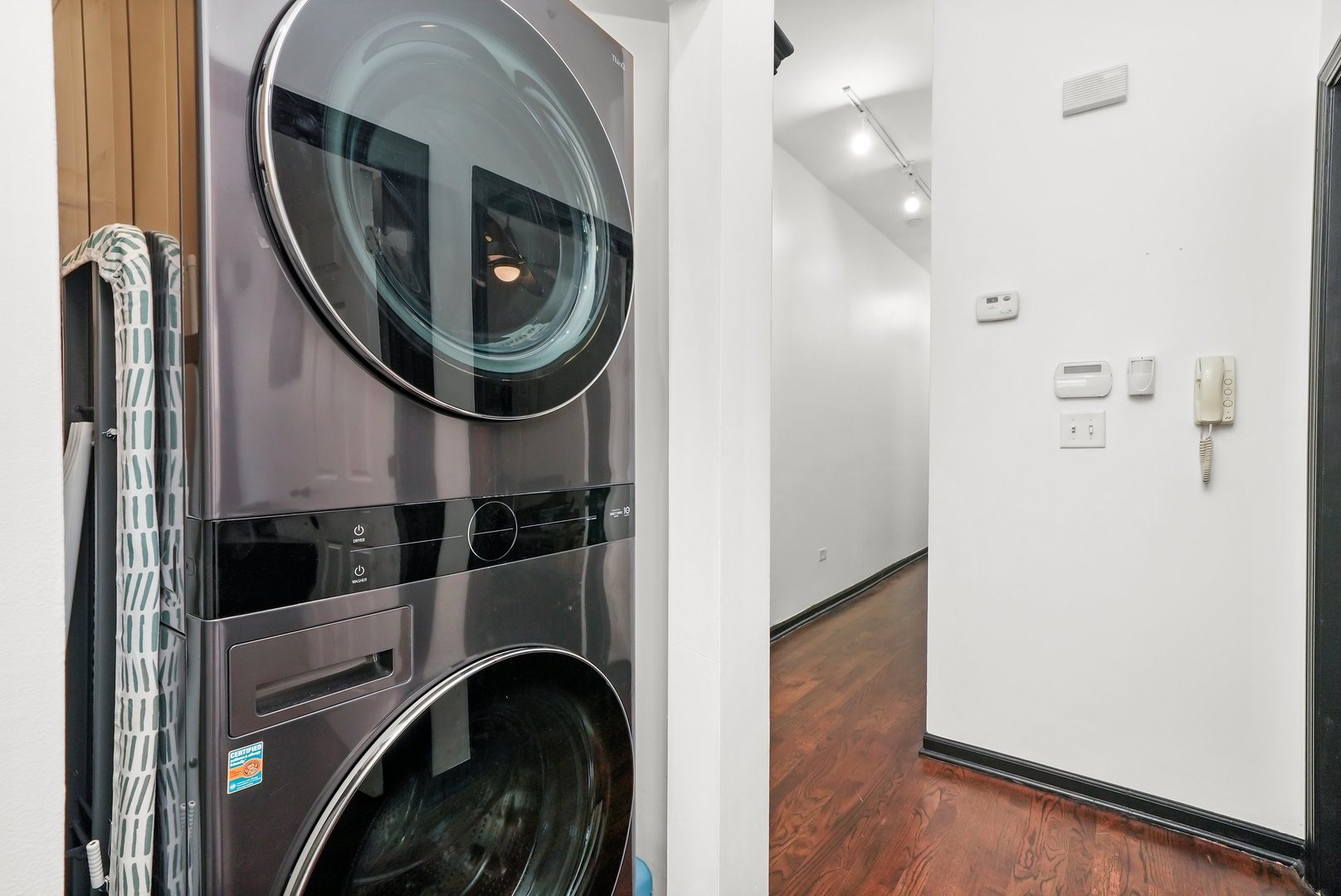 2432 West Harrison Street, Unit 3 Chicago, IL 60612 - Photo 25 of 32 a close view of a utility room with washer and dryer