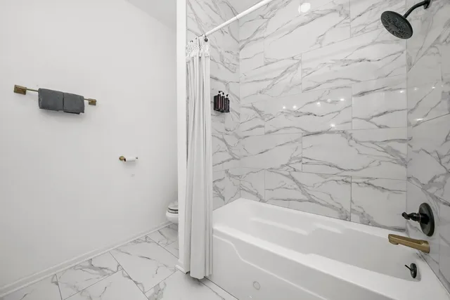 a bathroom with a bathtub