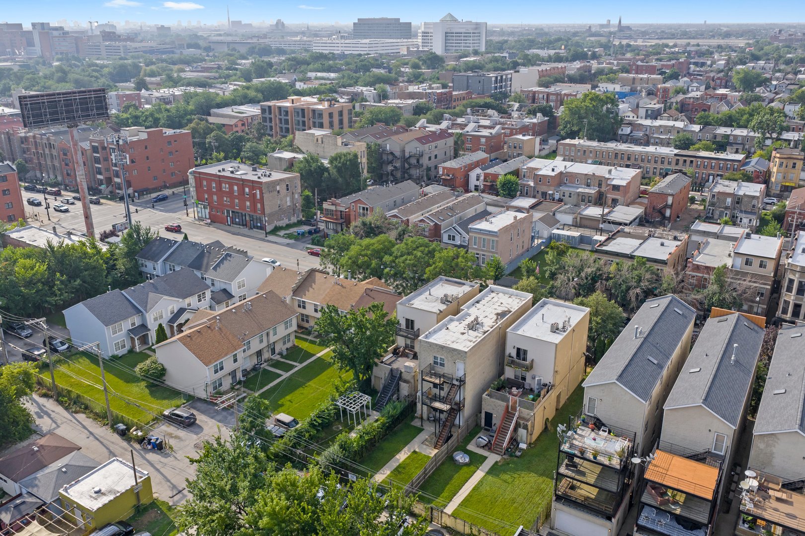 2432 West Harrison Street, Unit 3 Chicago, IL 60612 - Photo 10 of 32 an aerial view of a city with lots of residential buildings