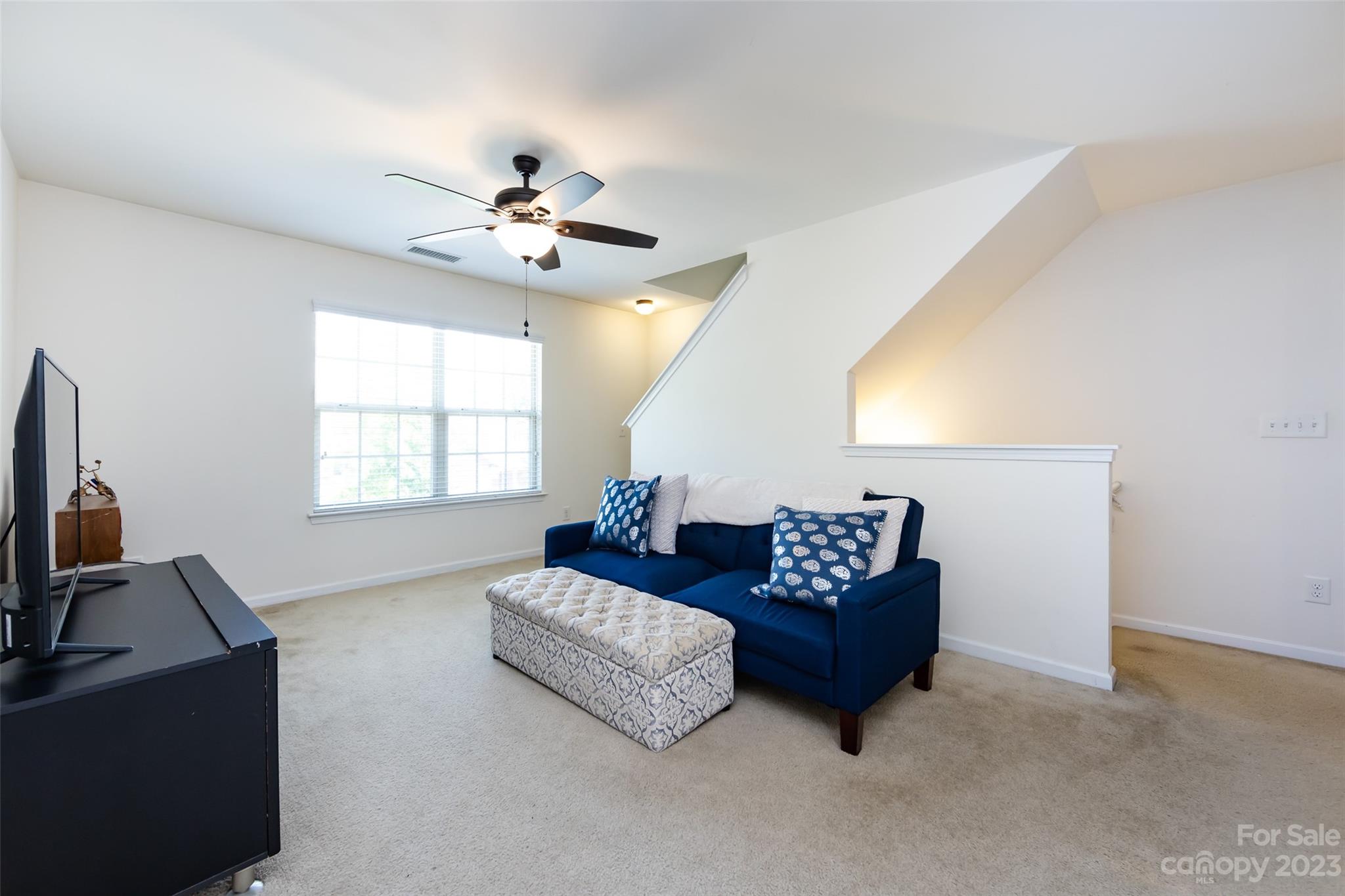 807 Rook Road Charlotte, NC 28216 - Photo 25 of 43 a living room with furniture and a window