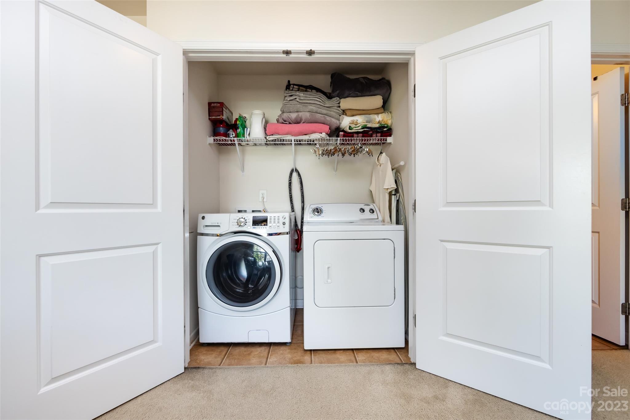 807 Rook Road Charlotte, NC 28216 - Photo 28 of 43 a utility room with dryer and washer