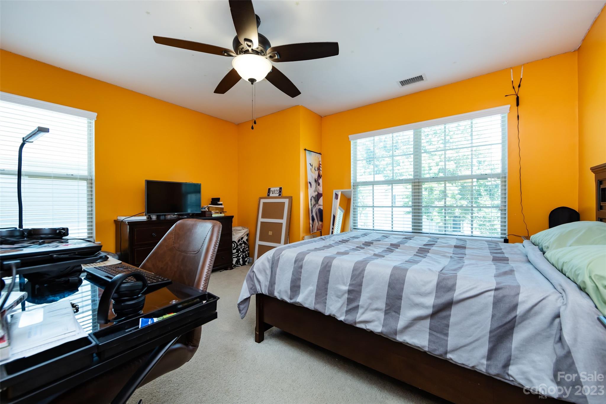 807 Rook Road Charlotte, NC 28216 - Photo 35 of 43 a bed sitting in a bedroom next to a window