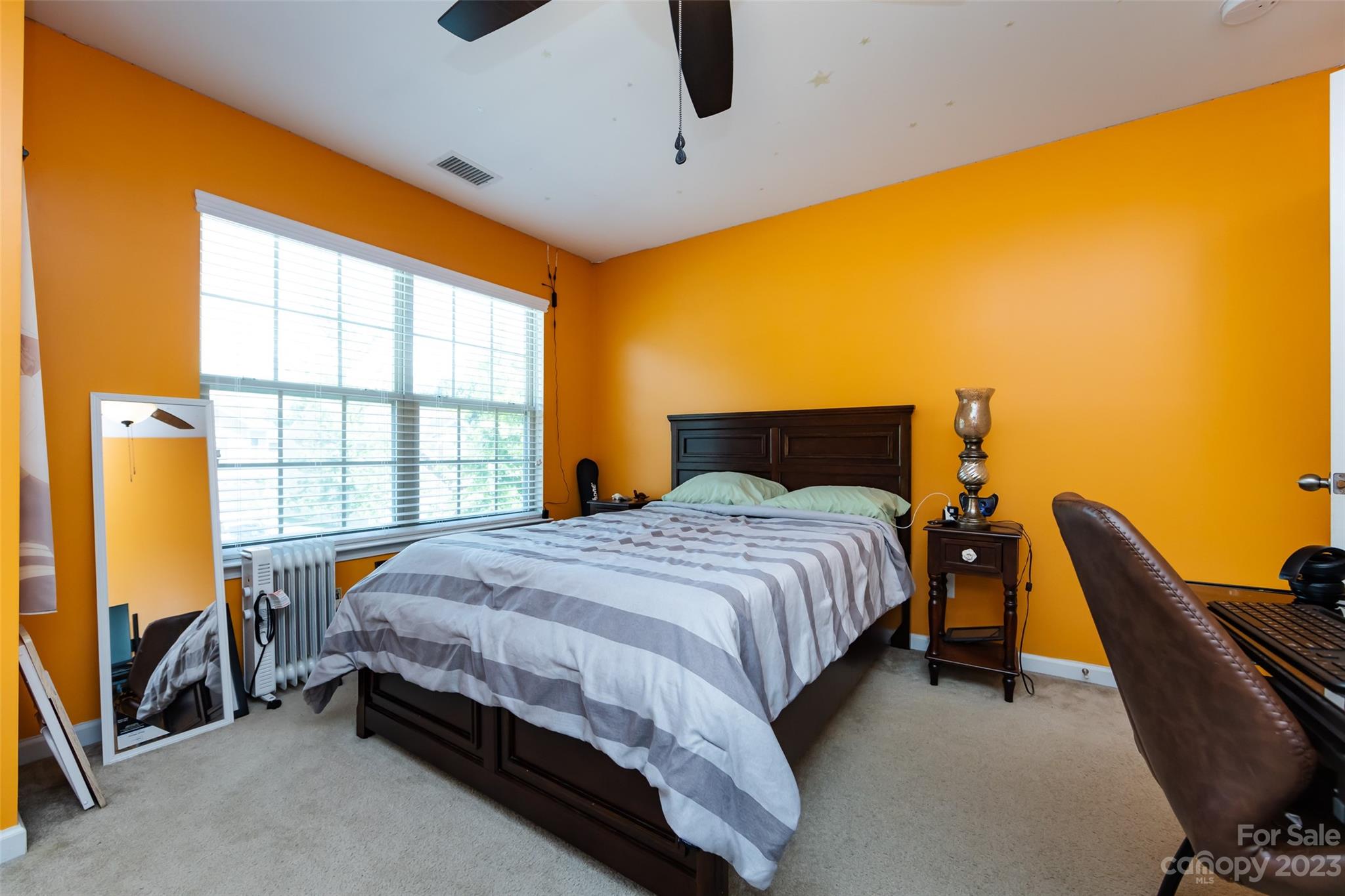 807 Rook Road Charlotte, NC 28216 - Photo 36 of 43 a bedroom with a bed and a window