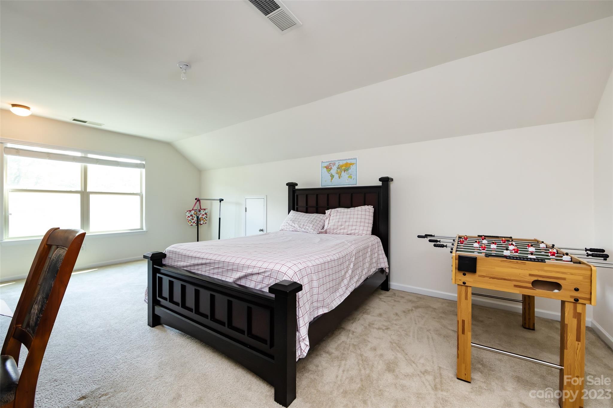 807 Rook Road Charlotte, NC 28216 - Photo 39 of 43 a bedroom with a bed and a window