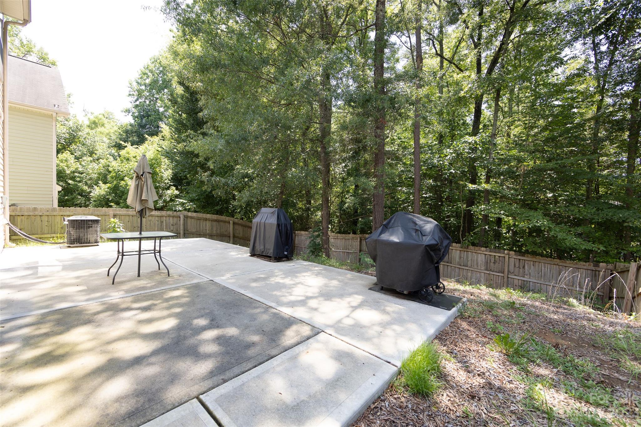 807 Rook Road Charlotte, NC 28216 - Photo 41 of 43 a view of a backyard with sitting area